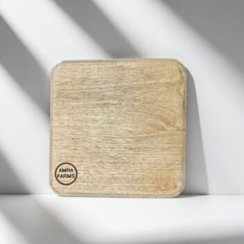 small wooden chopping board for herbs on kitchen counter