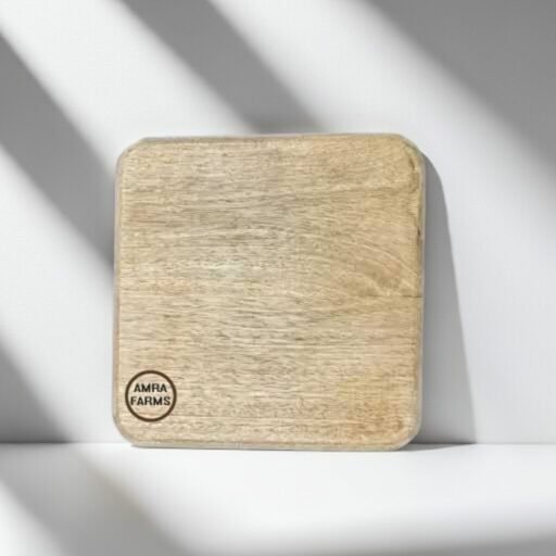 small wooden chopping board for herbs on kitchen counter