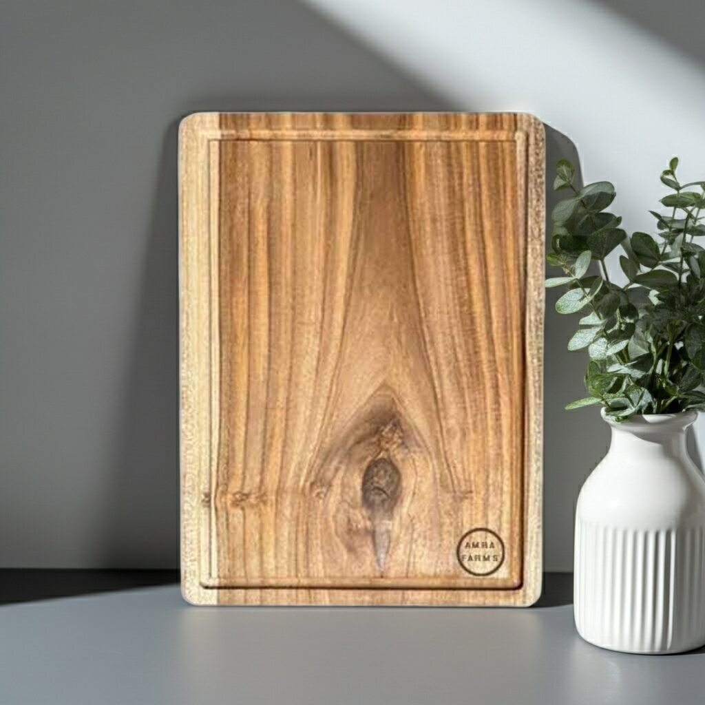 amra farms thick teak wood chopping board premium heavy duty cutting board with built in handle deep juice grooves for meat vegetables kitchen prep Thick teak wood chopping board by Amra Farms with deep juice grooves and built-in handle for meat and vegetable cutting