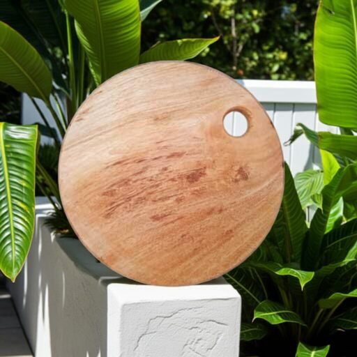 "Durable handcrafted round wood cutting board for chefs"