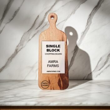 "Handcrafted hardwood chopping board with ergonomic handle"
