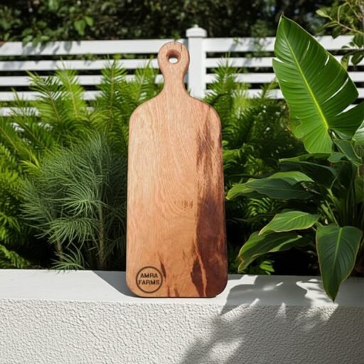 "Heavy-duty mango wood cutting board with hanging handle"