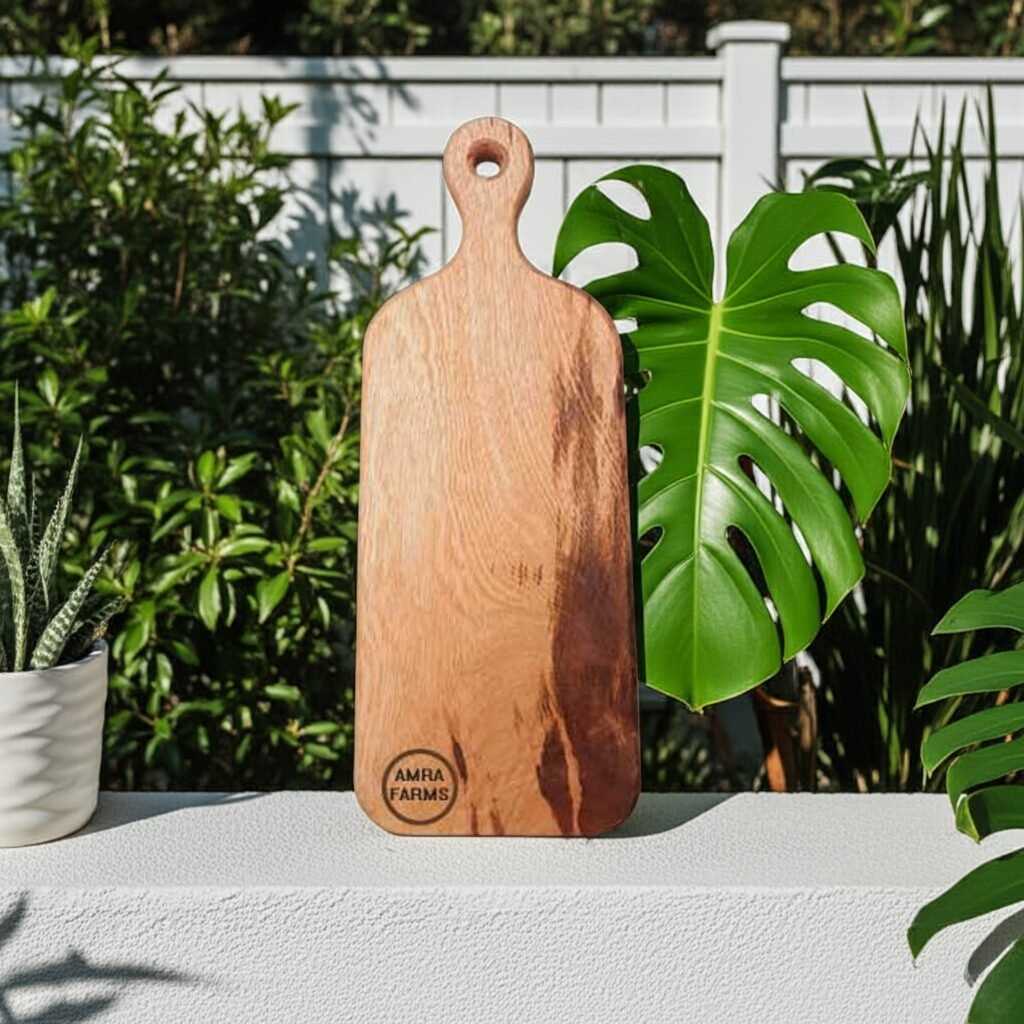 "Durable mango wood chopping board with ergonomic grip handle"
