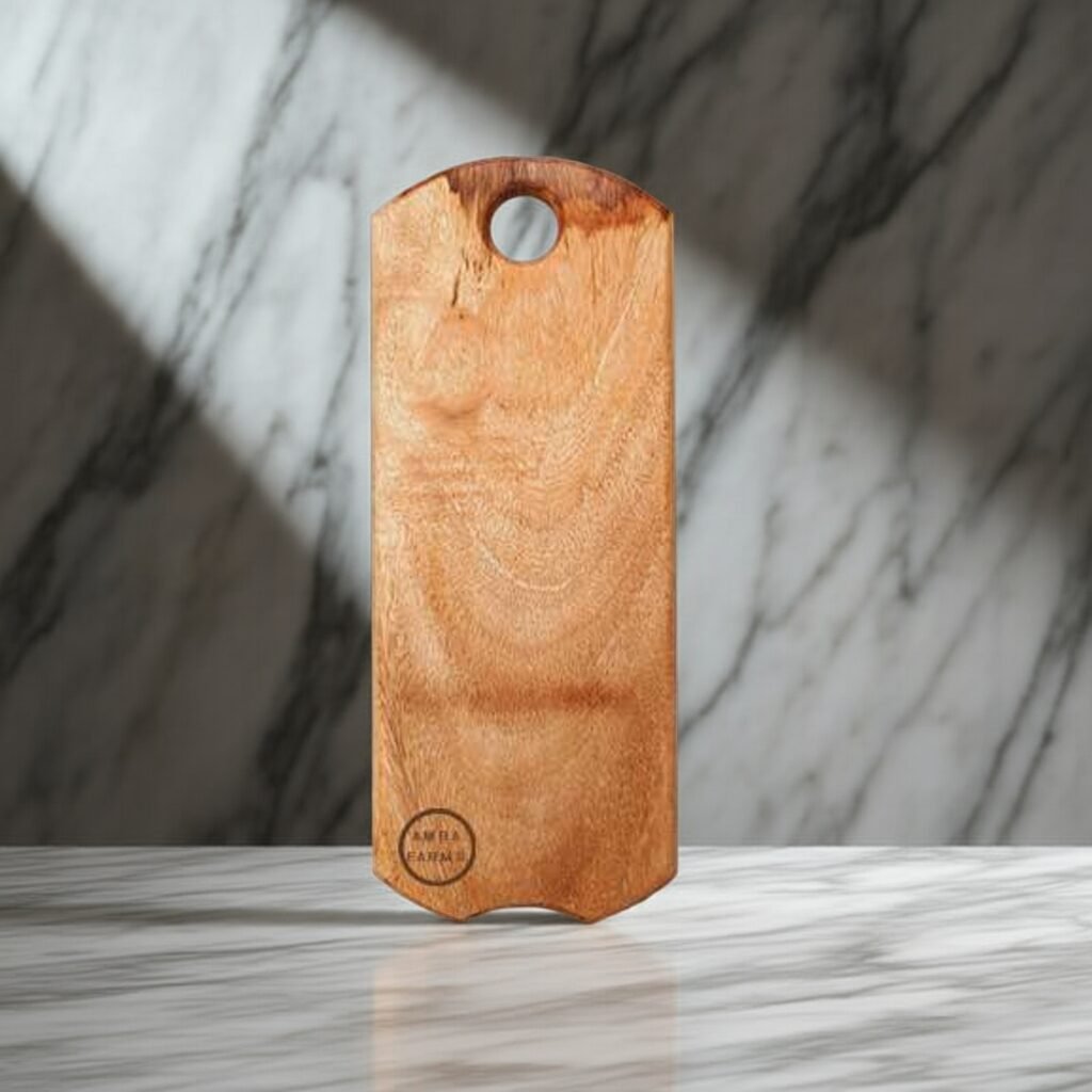 "Compact hardwood chopping board with ergonomic handle and wall hook hole"