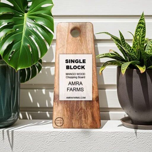 "Handcrafted wooden chopping board with handle for kitchen and serving"