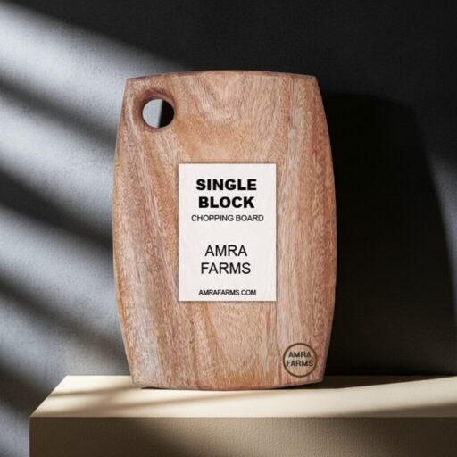"Small mango wood cutting board with handle for serving and chopping"