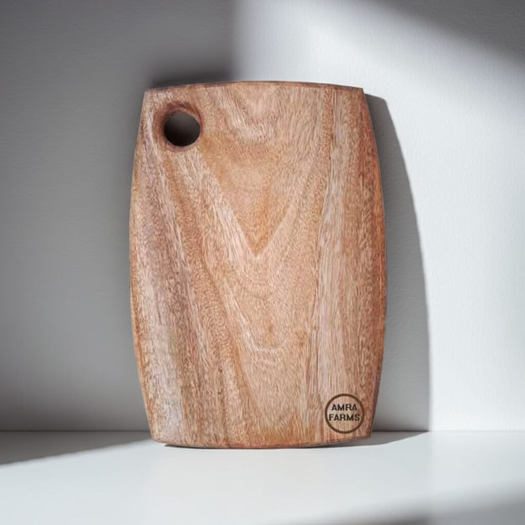Small mango wood cutting board with handle, 34 x 24 x 2 cm, ideal for chopping, slicing, and serving in the kitchen