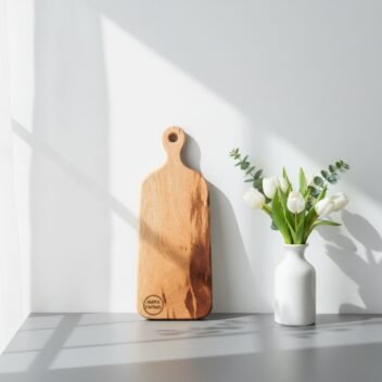 Small mango wood cutting and serving board by Amra Farms, premium wooden chopping board with handle for vegetables, fruits, and kitchen use