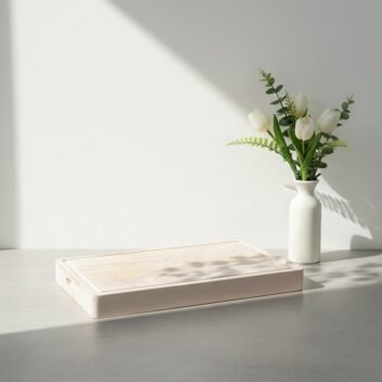 Thick mango wood chopping block on a full white background