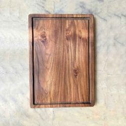 Teak wood kitchen cutting board with juice groove